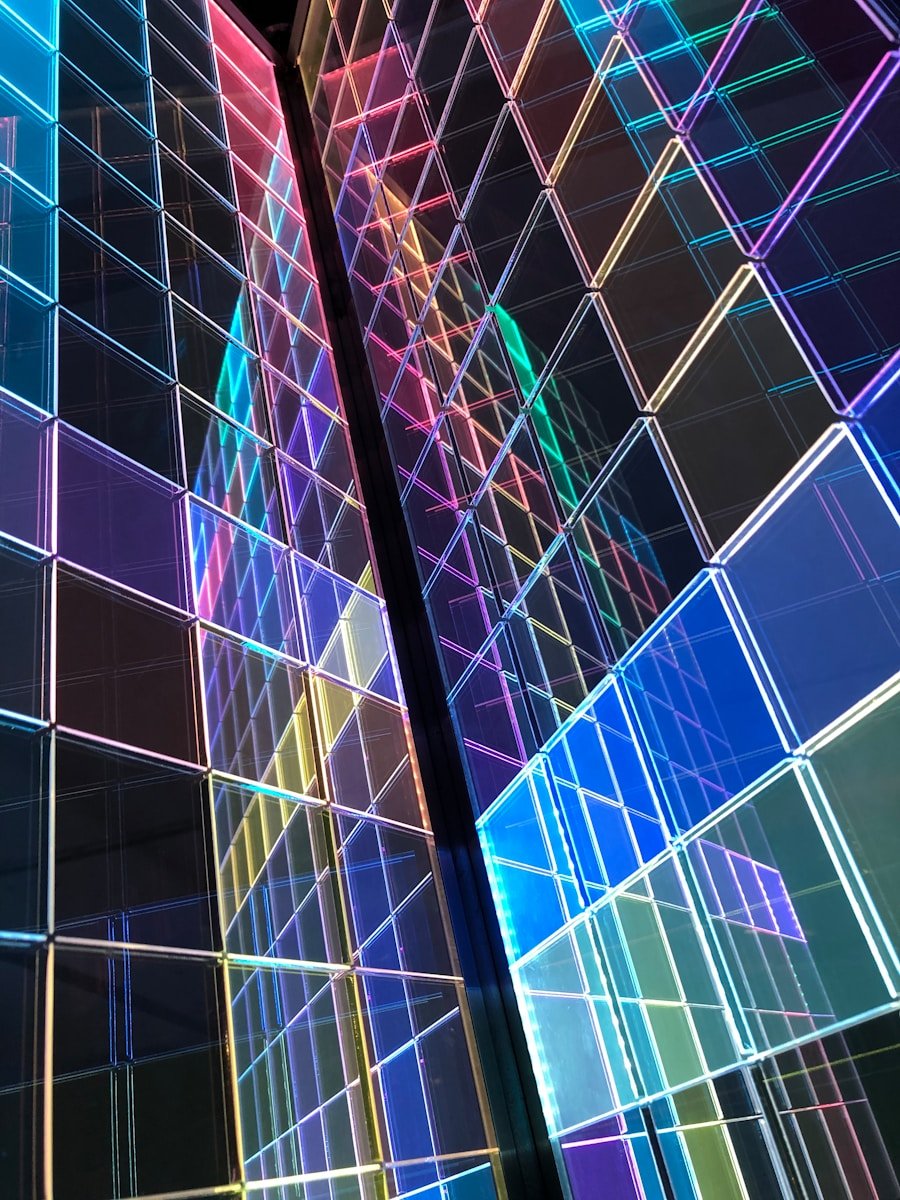 a tall building with many different colored squares on it